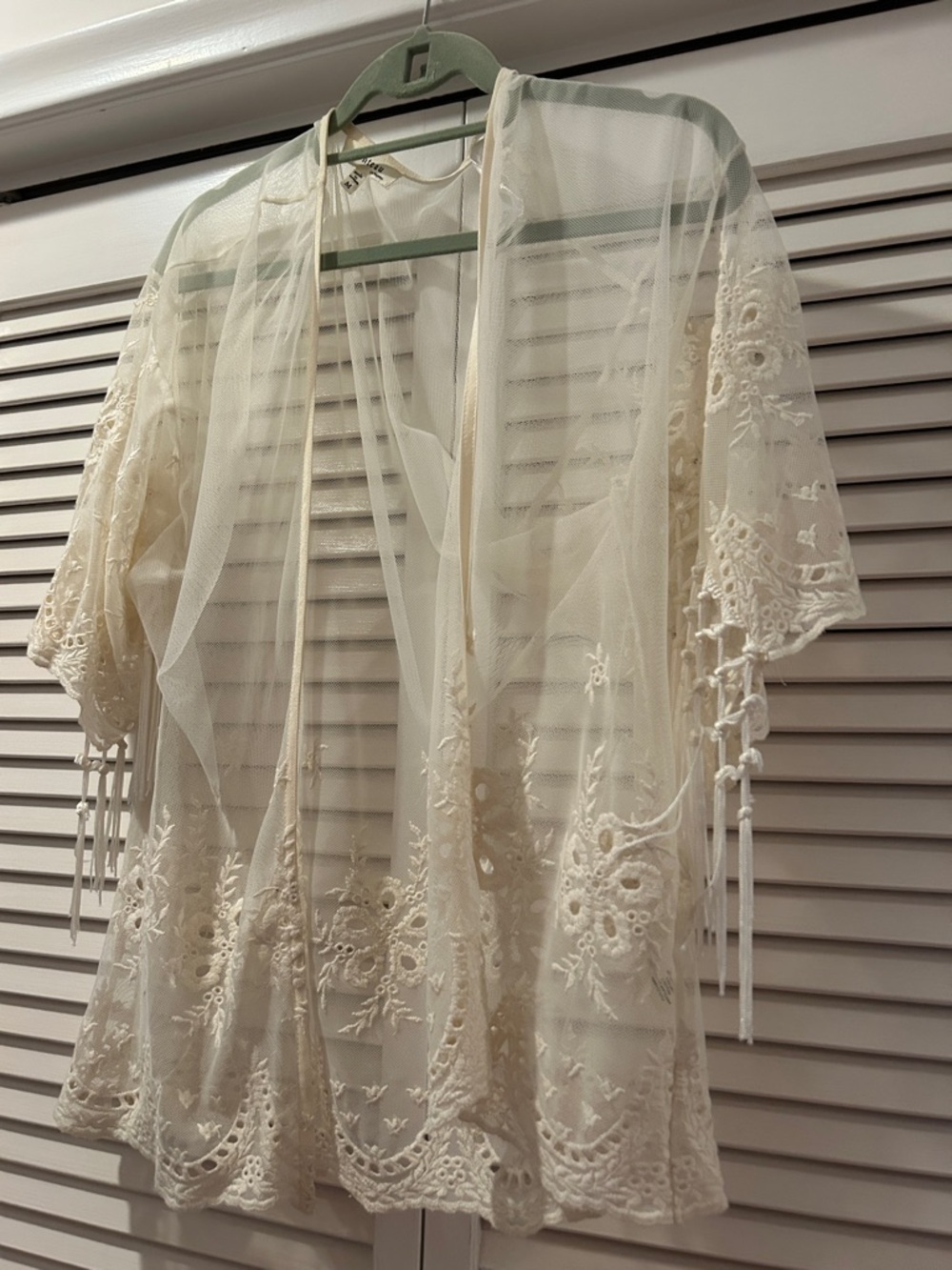 MonteauLayering shrug w beautiful embroiderymacramé like fringe inder  sleeves